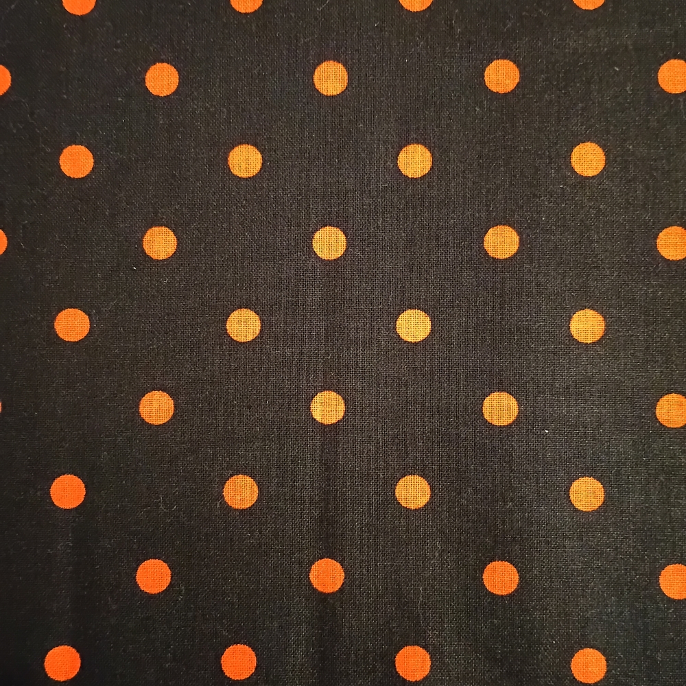 Black Fabric with Orange Polka Dot Pattern. Price Per Yard